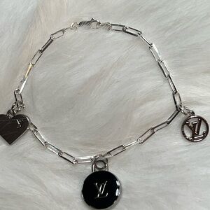 Elegant Sterling Silver Charm Bracelet with Authentic Heart and Logo Pendants